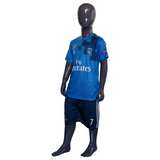 Mannequin wearing a blue sports jersey with visible branding on a white background