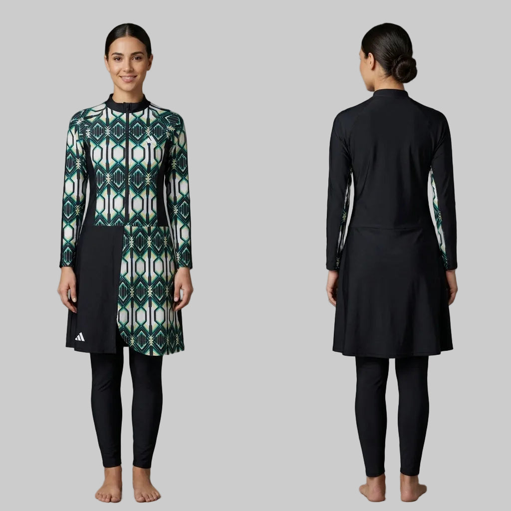 A woman modeling a long-sleeve athletic tunic and leggings set in a studio setting, shown from both the front and back. The front view shows a geometric pattern in green, white, and black, with a solid black side panel and leggings.